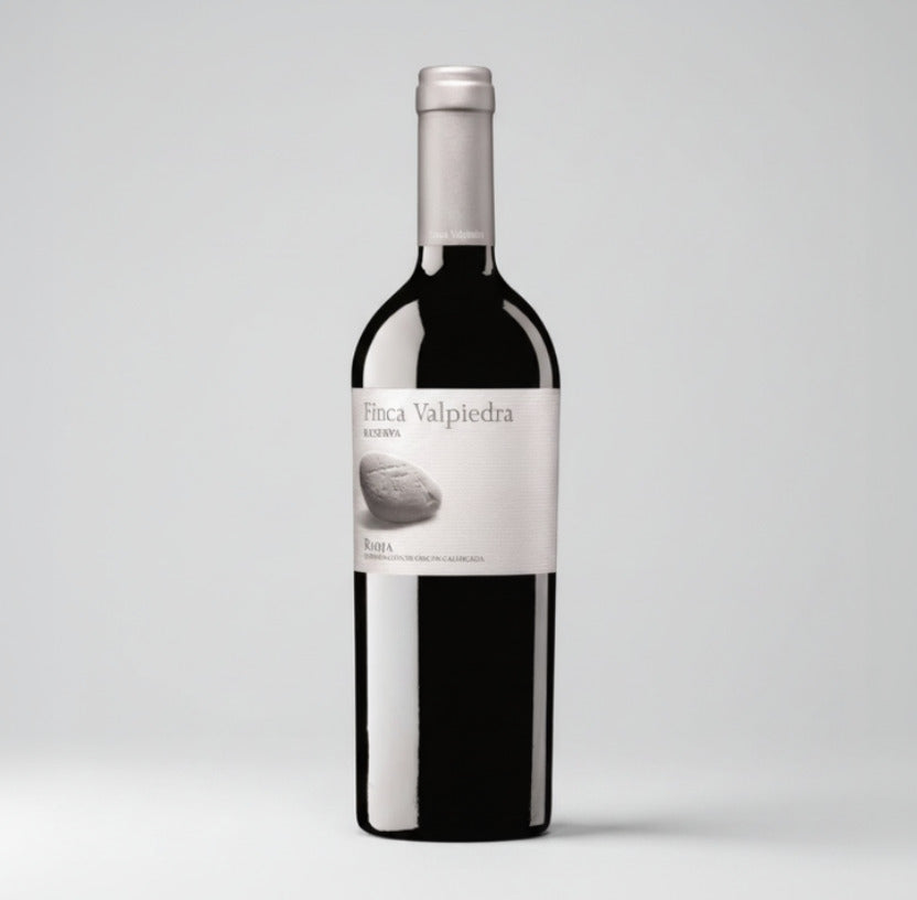 Bottle of Finca Valpiedra Reserva Rioja wine with a white label.
