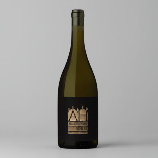 A wine bottle with a black label with a white backdrop