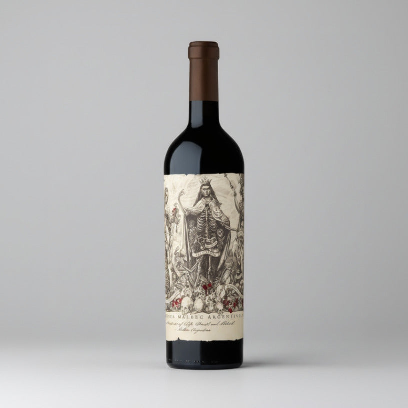 A bottle of Catena Zapata Malbec Argentino red wine with a detailed, vintage-style label.