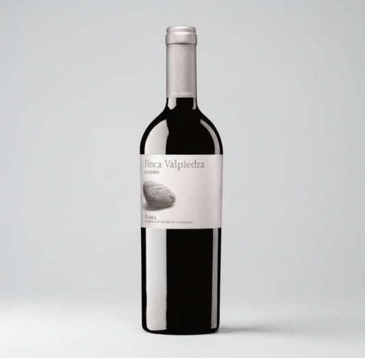 Bottle of Finca Valpiedra Reserva Rioja wine with a white label.